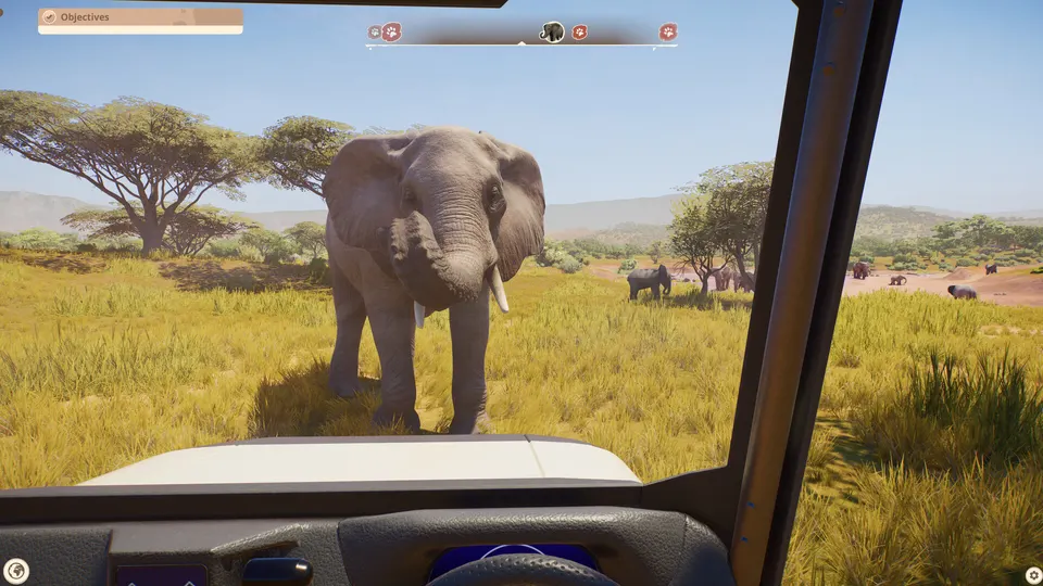 An African elephant approaching a safari vehicle on a wildlife reserve in Planet Zoo 2